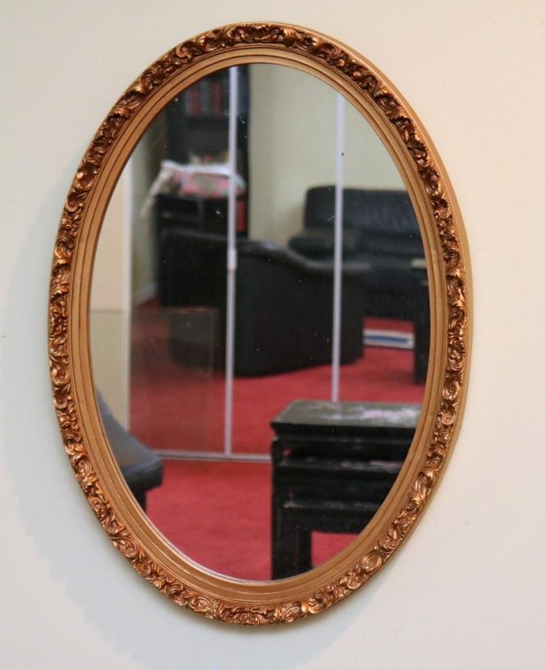 Gold Tone Oval Wall Mirror