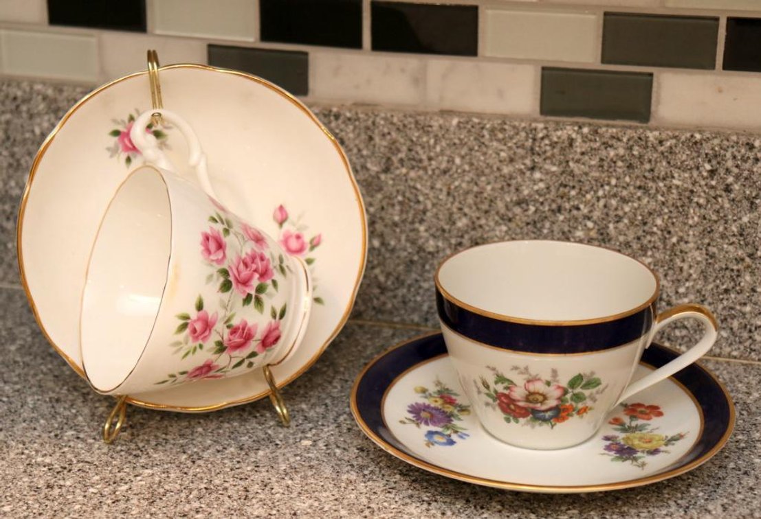 Two Porcelain Teacups and Saucers