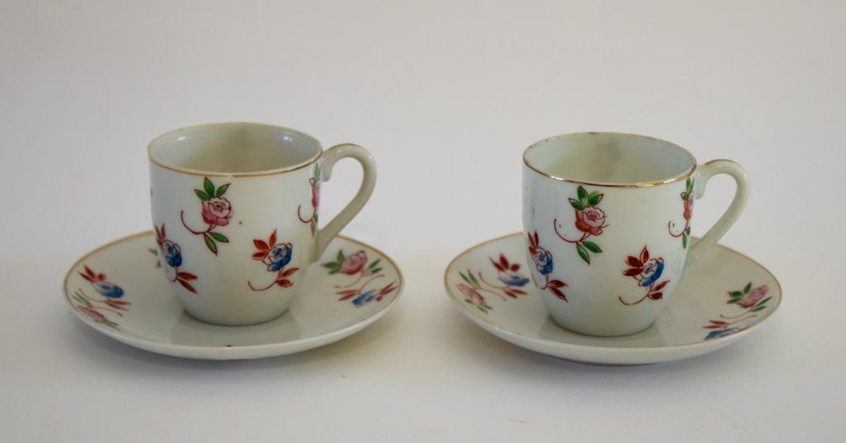 Two Demitasse Cups and Saucers