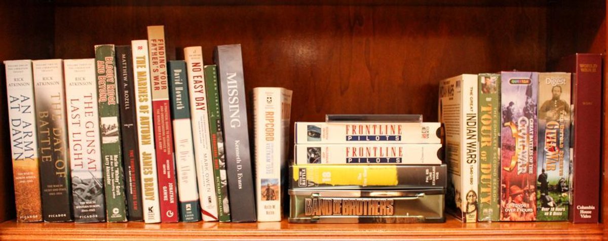 Assorted War-Themed Books and Videos