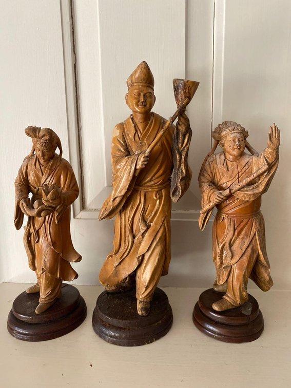 Three Carved Wooden Asian Statues