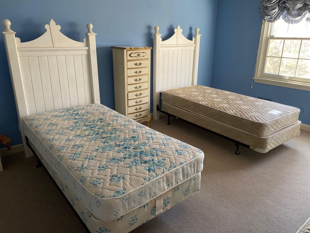 Pair Of White Cannonball Headboards and Bedding