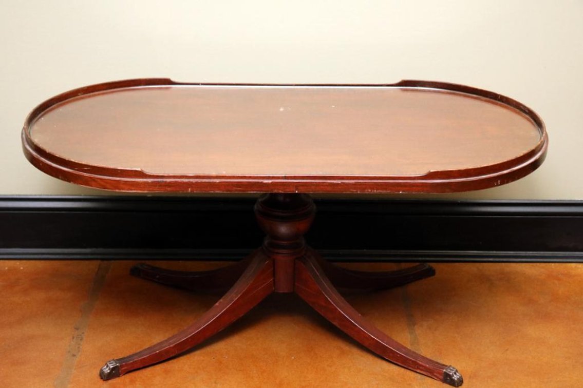 Antique walnut coffee table with glass inset top