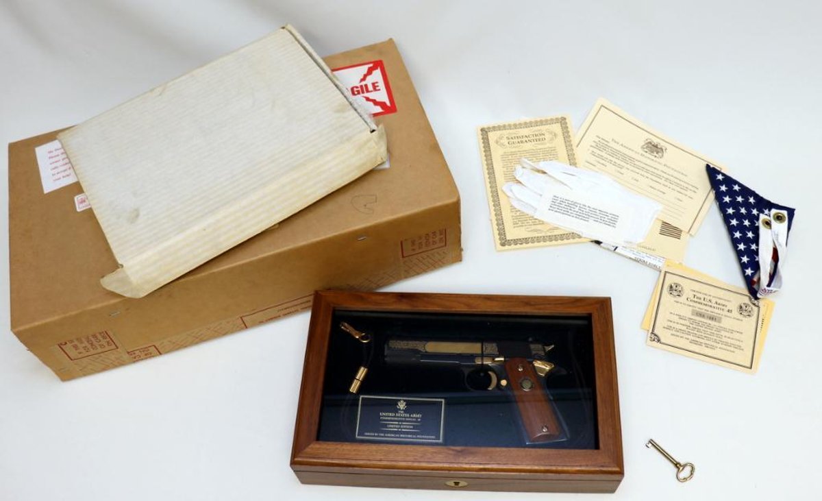 The U.S. Army Commemorative M1911A1 .45 cal pistol in display case