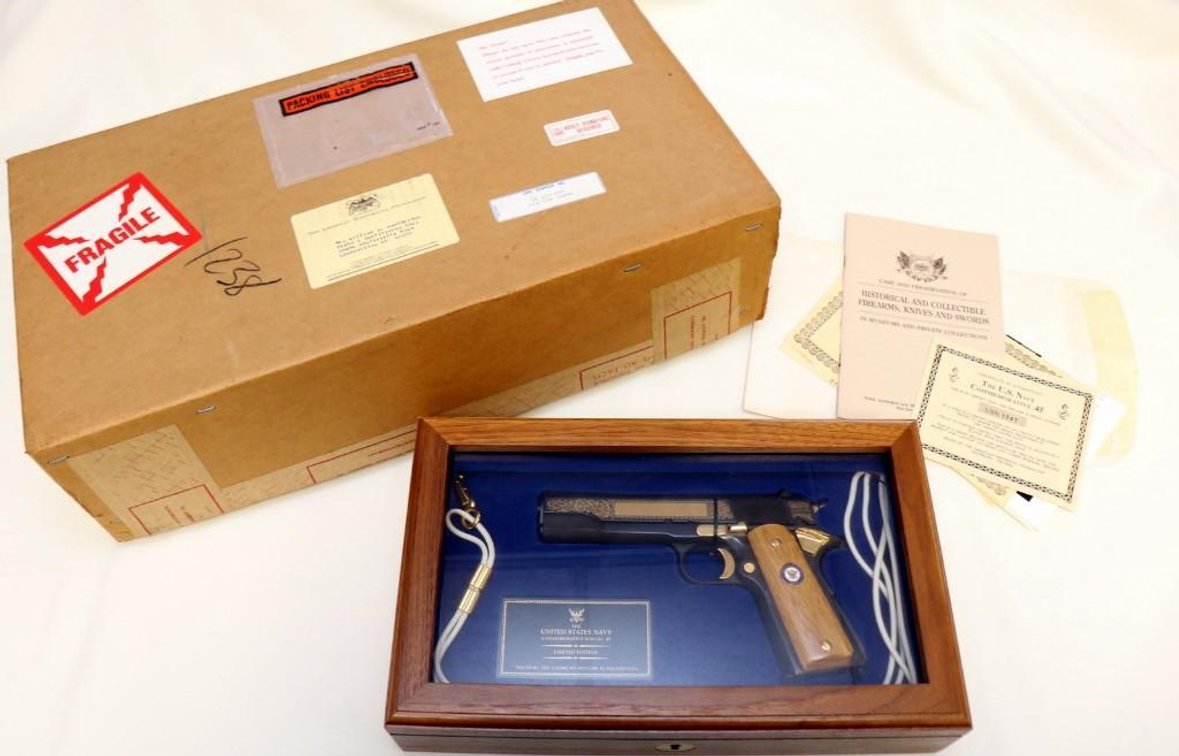 The U.S. Navy Commemorative M1911A1 .45 cal pistol in display case