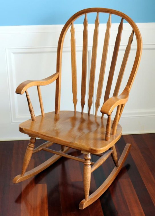 Solid oak rocking chair with spindle back