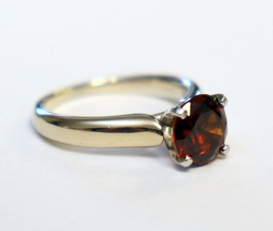 Beautiful GIA Certified 2.55 carat Grossular Garnet (Hessonite variety) mounted in 18k gold and platinum