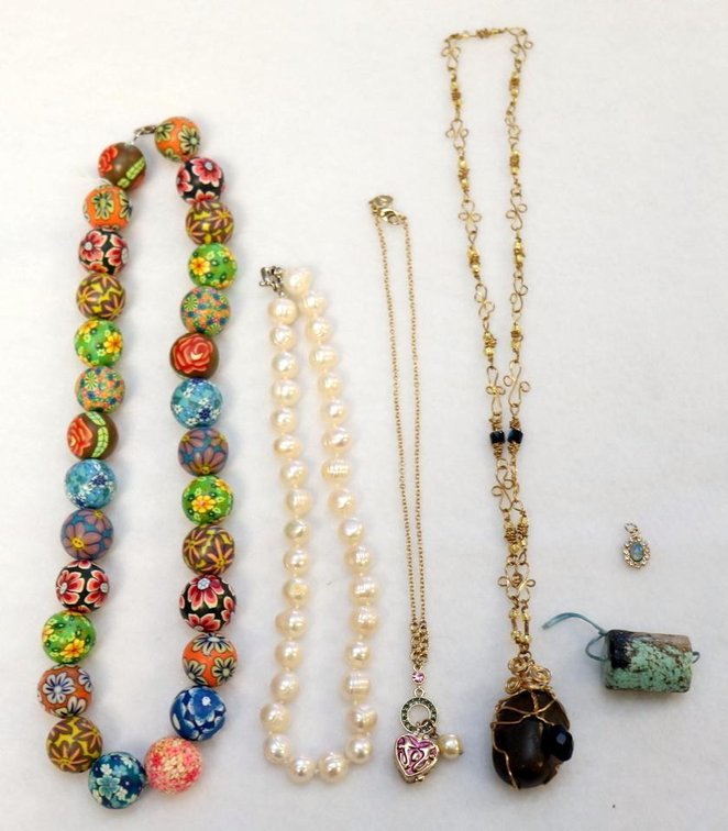 Assorted costume necklaces and turquoise bead