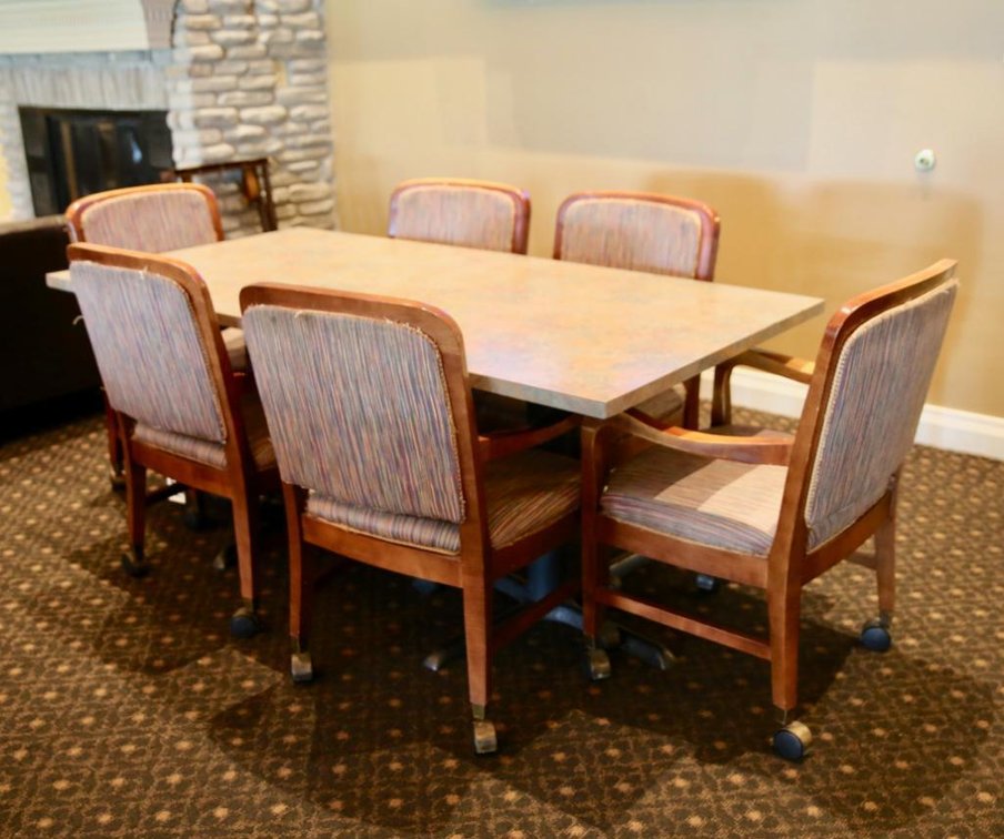 Six Upholstered Armchairs