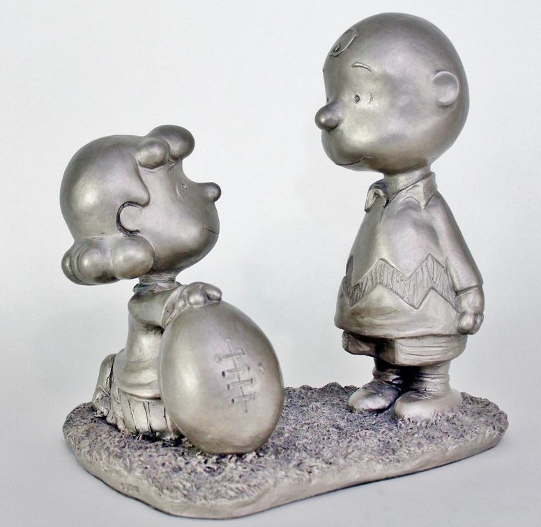 Charlie Brown Football Struggle Sculpture