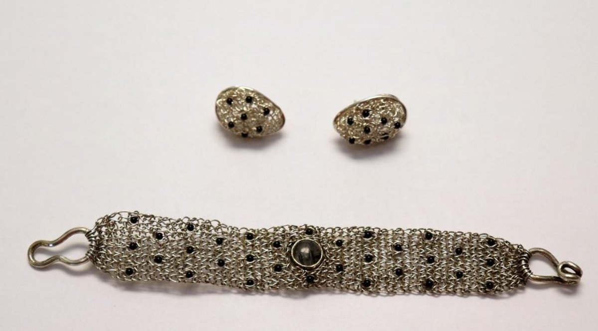 Sterling Silver designer bracelet with matching earrings and smoky quartz center