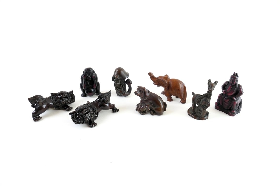 Eight Carved Japanese Figurines