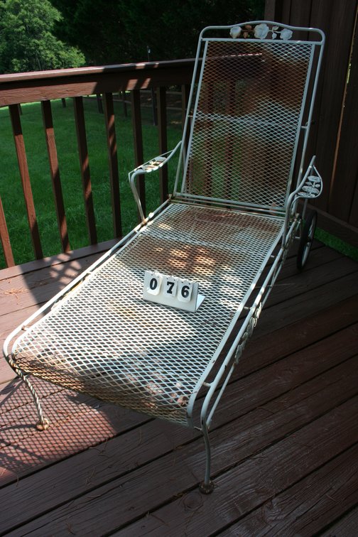 Image for White wrought iron lounge chair with rear wheels