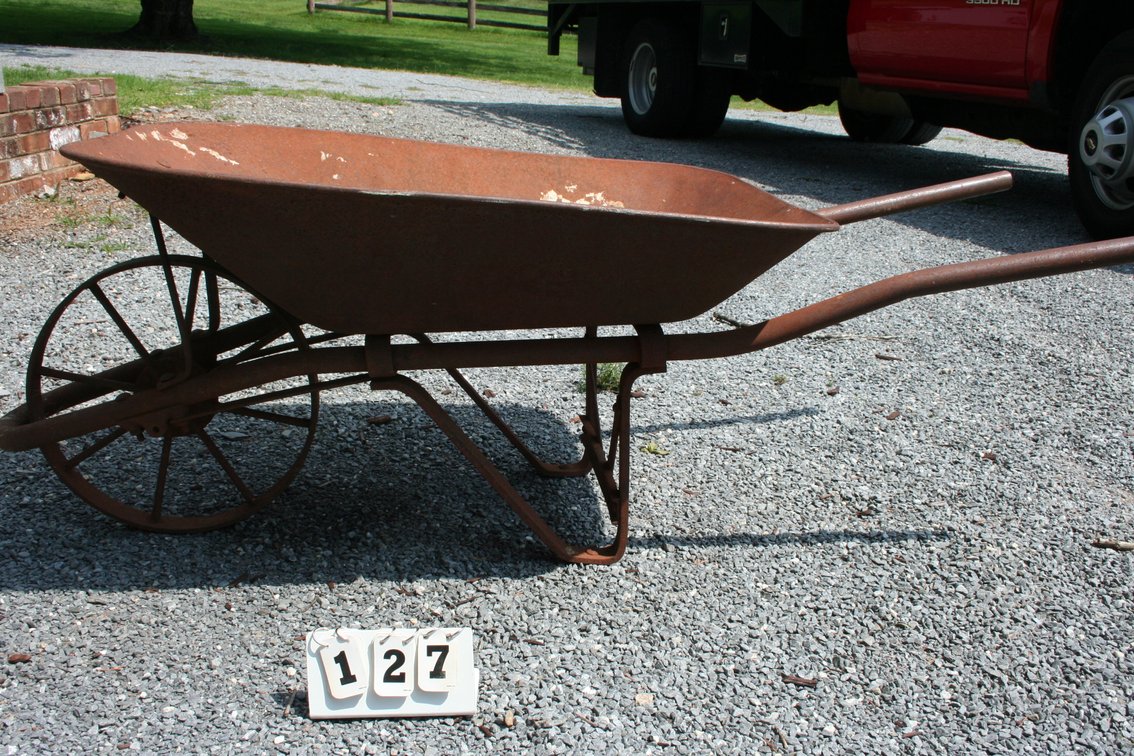 Image for Antique wheelbarrow with iron wheel
