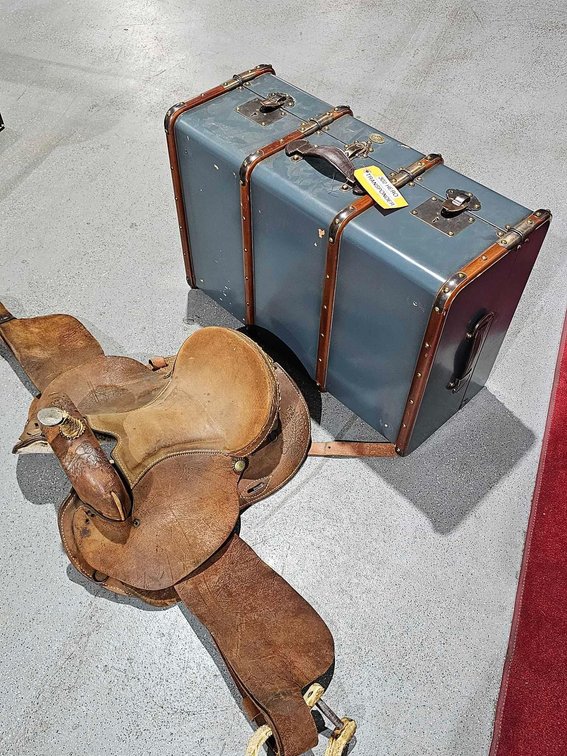 Leather Saddle and Wooden Suitcase
