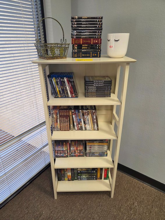 Cabinet w/ Assorted DVDs