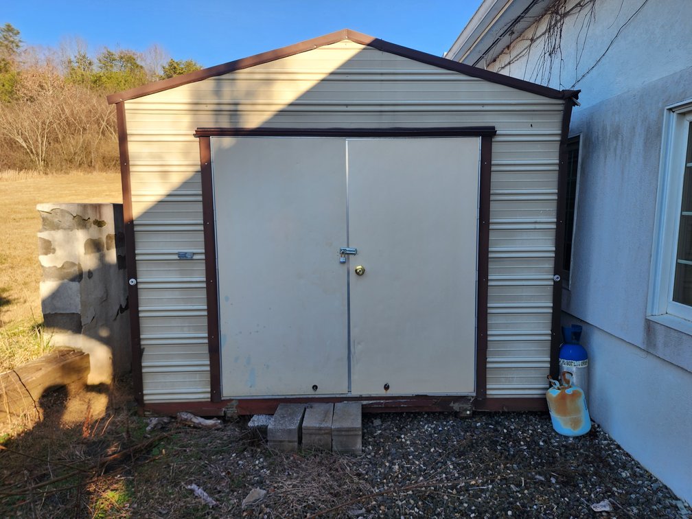 20' x 10' Metal Storage Building on Backside of Restaurant