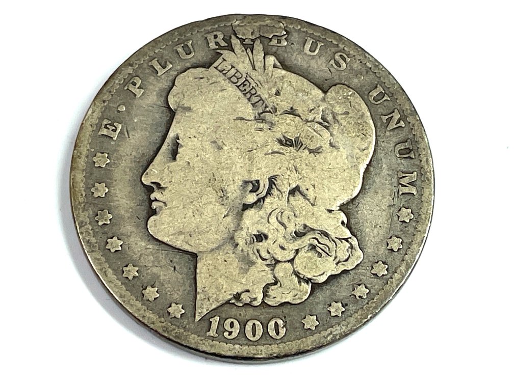 1900-O Morgan Silver Dollar - Cud Error at 12:00