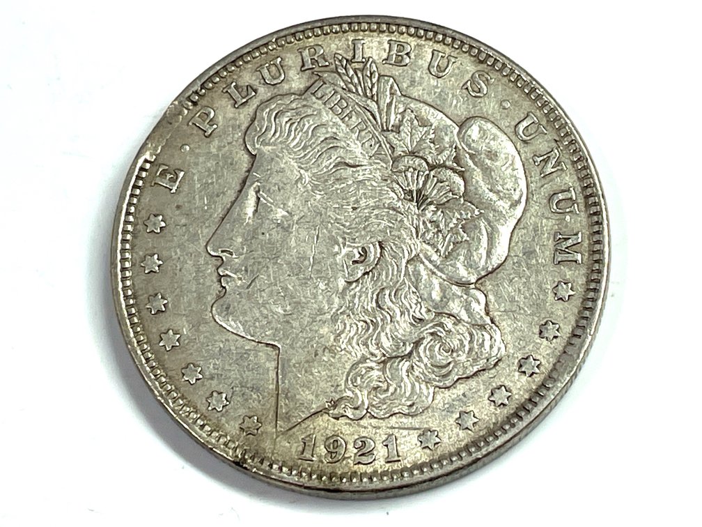 1921 Morgan Silver Dollar - Clip at 10:00