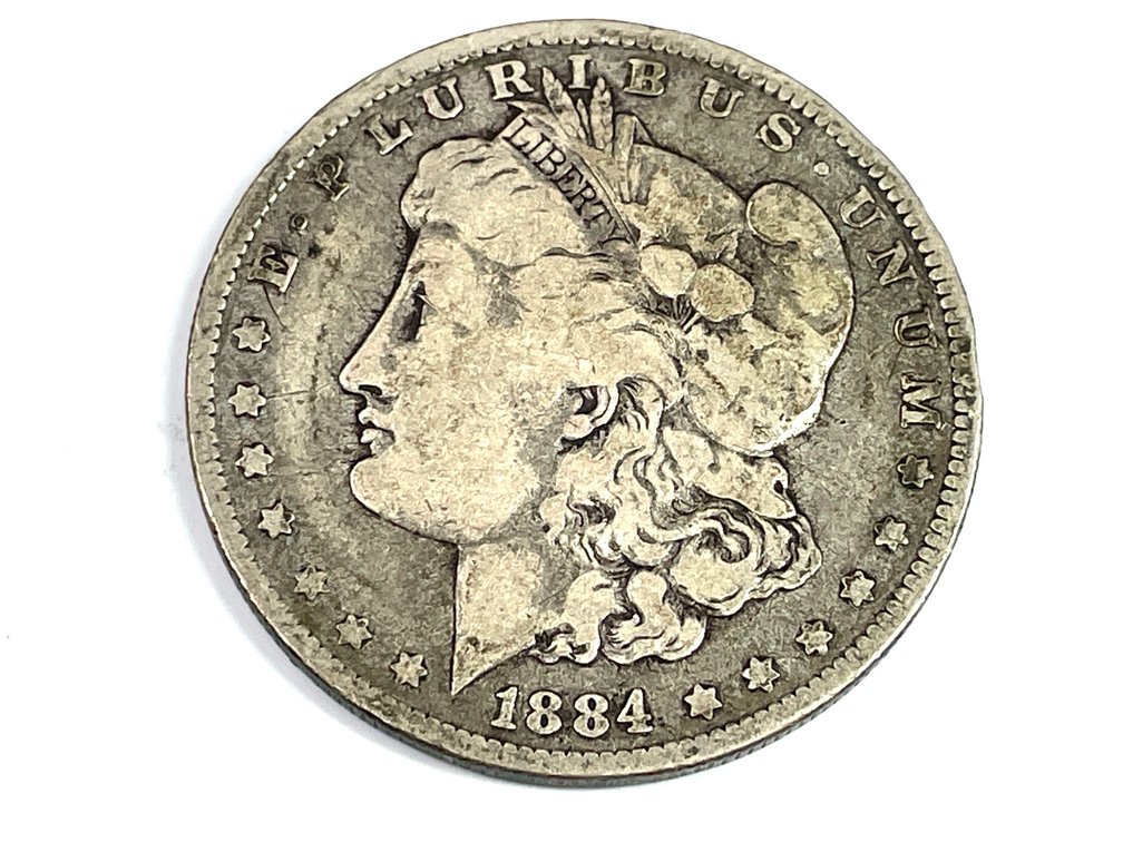 1884-O Morgan Silver Dollar with Filled Mint Mark