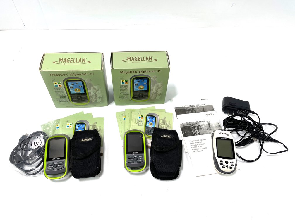 Three Magellan eXplorist Handheld GPS Receivers