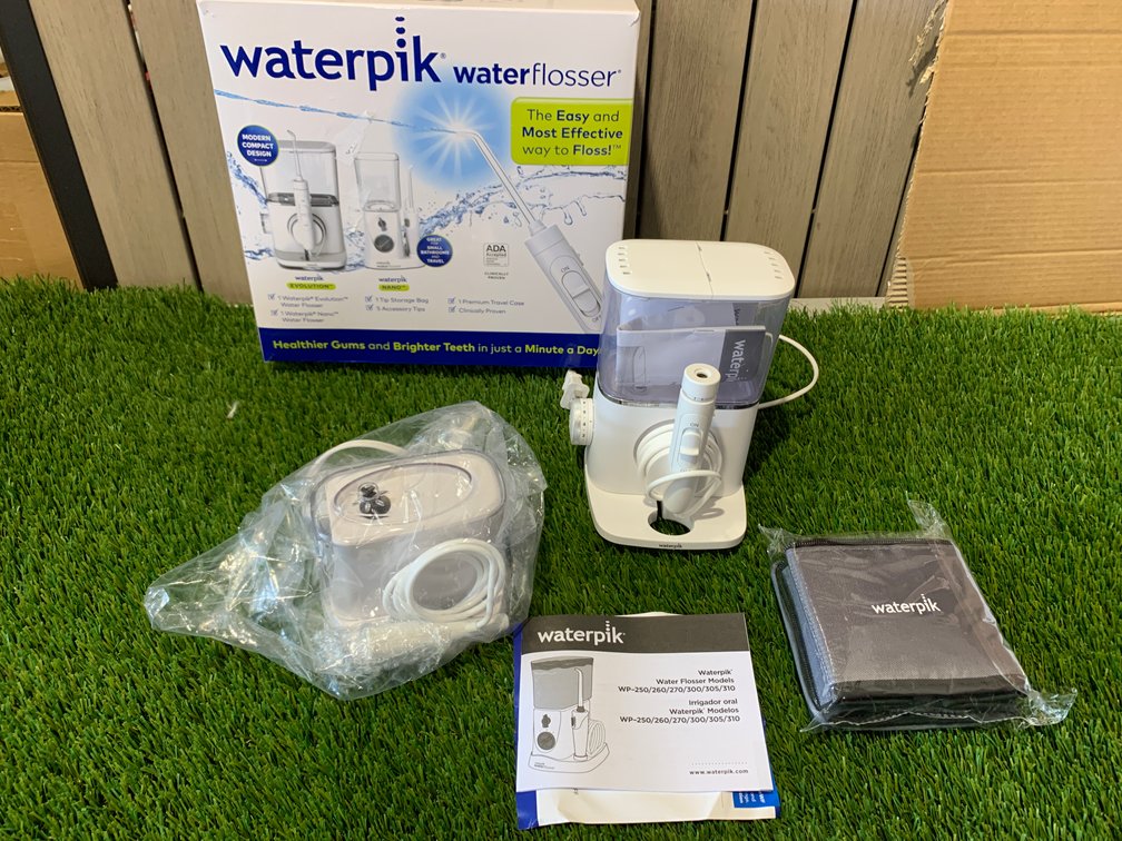Waterpik Water Flosser - Evolution and Nano (sealed) includes travel bag (jet tips not included) 