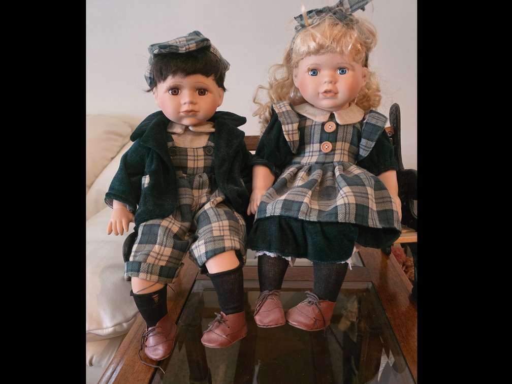 Porcelain Dolls on Bench
