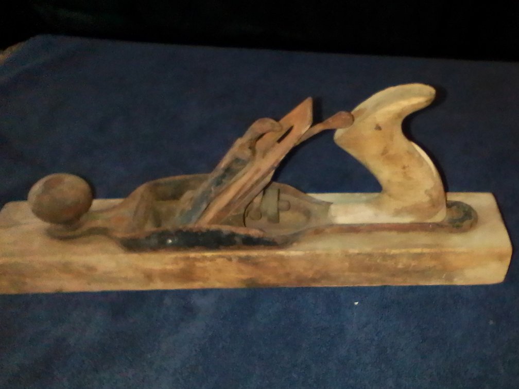 Antique wood planer and a small new Stanley planer