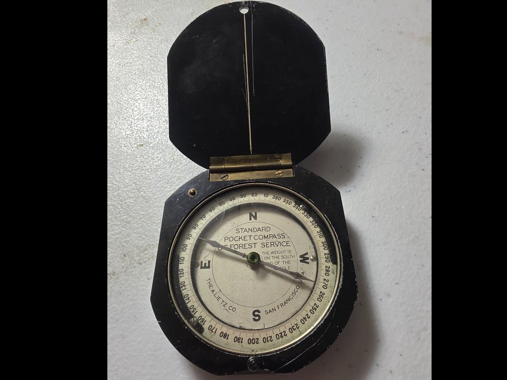 Lietz Forest Service Compass, 1940 A black metal compass case.