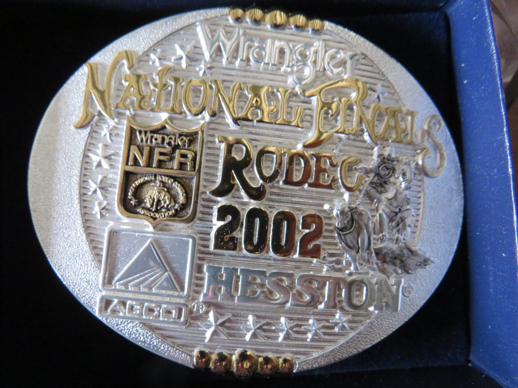2002 Montana Silversmith’s Hesston NFR Belt Buckle, in original box.