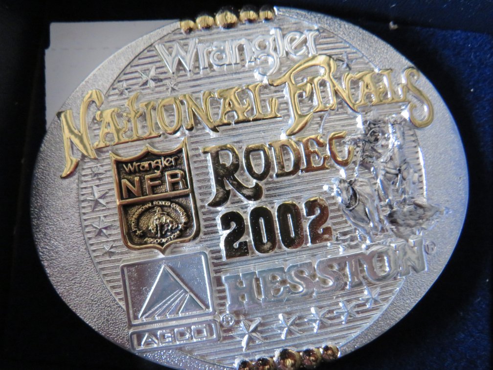 2002 Montana Silversmith’s Hesston NFR Belt Buckle, in original box.