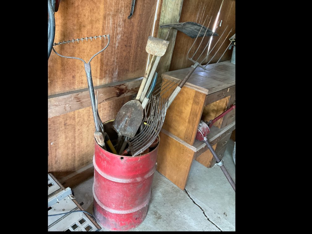 Barrel Of Assorted Yard Tools