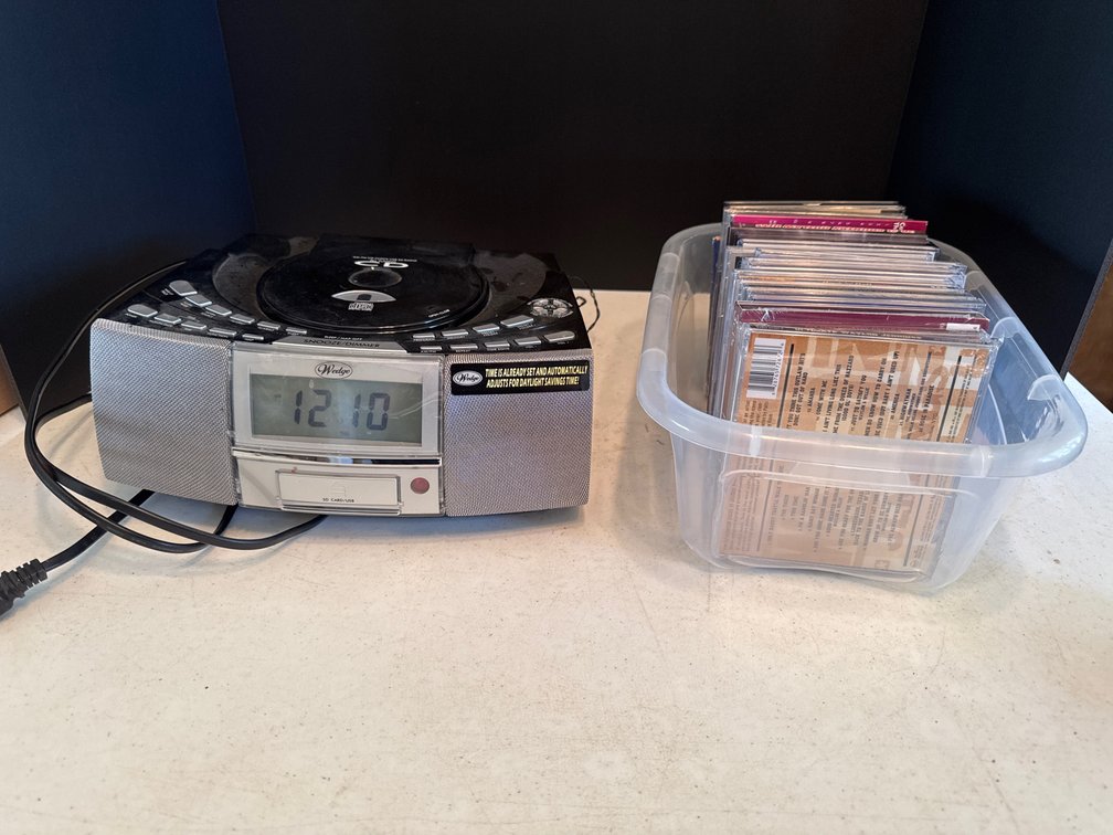 Wedge AM/FM CD Clock Radio and CD’s