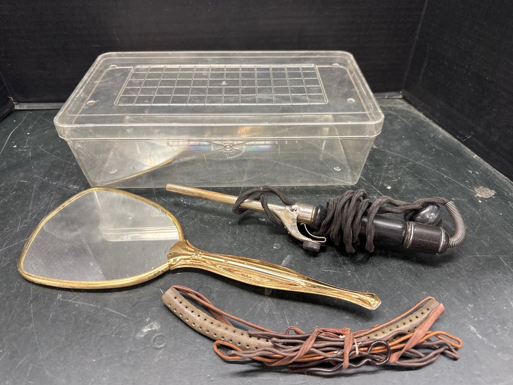 Antique Handheld Mirror, curling Iron, and Hair Tie