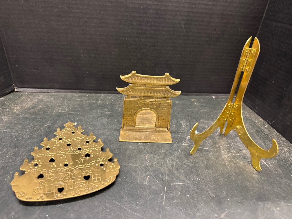 Brass Book End, Picture Holder, and Hot Plate