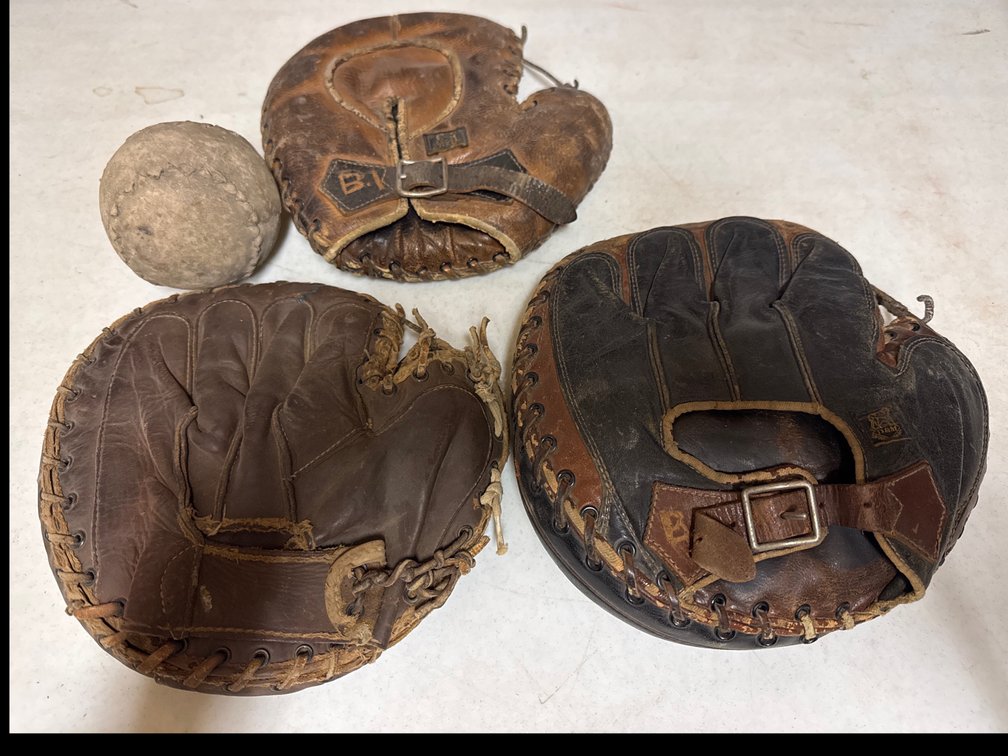 Catchers Mitts and Old Baseball
