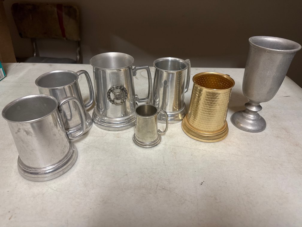 Clear Bottom Silver Toned Metal And Pewter Mugs