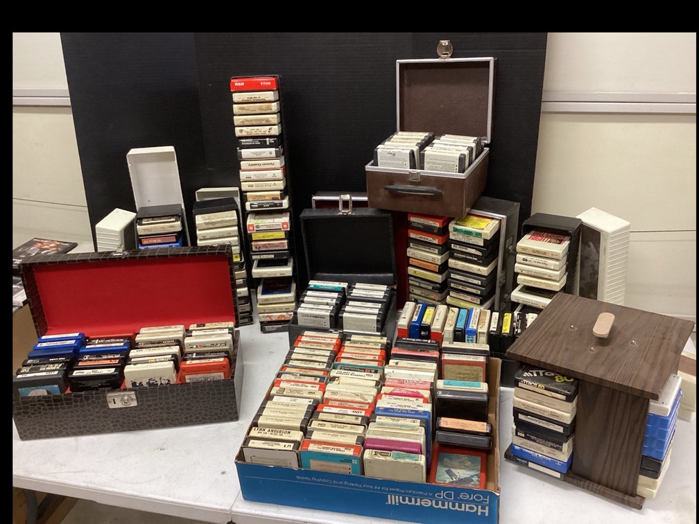 Assorted Cases With 8-Track Tapes