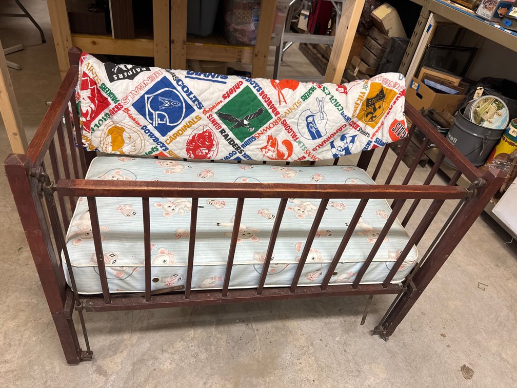 Antique Crib, Mattress, and Football Team Bed Spread