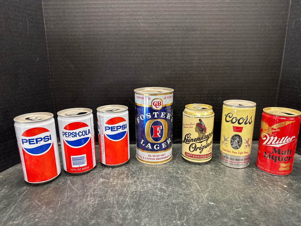 Empty Pepsi, Foster’s Lager, Coors, Miller Malt, and Leinenkugel”s