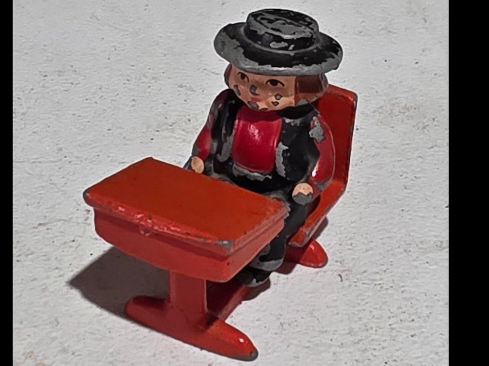 Cast Iron Amish Child in Desk