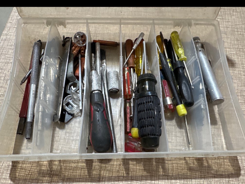 Assorted Mini Screwdrivers and Leather Tools