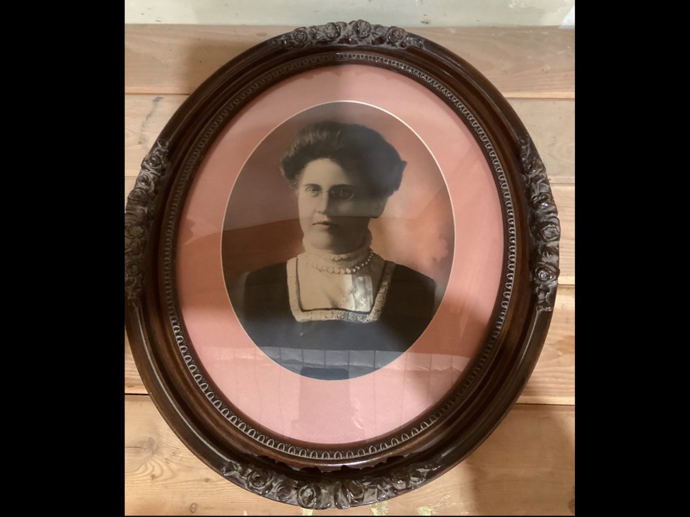 Photo Of Lady Framed In Convex Glass