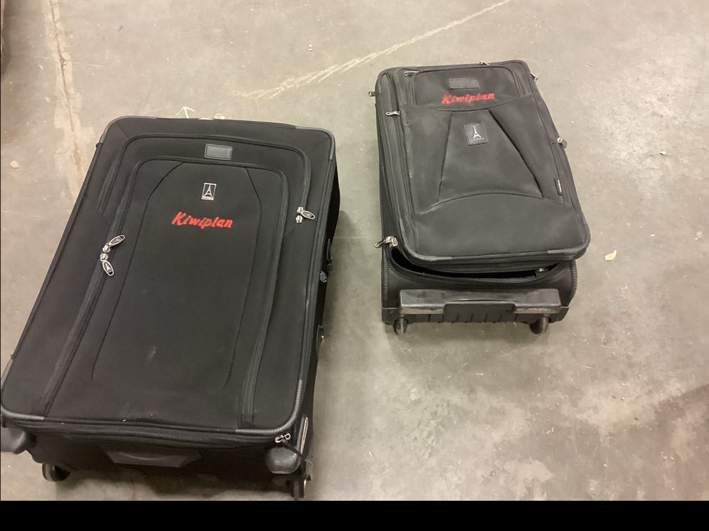 Black Softside Rolling Suitcases by Travelpro