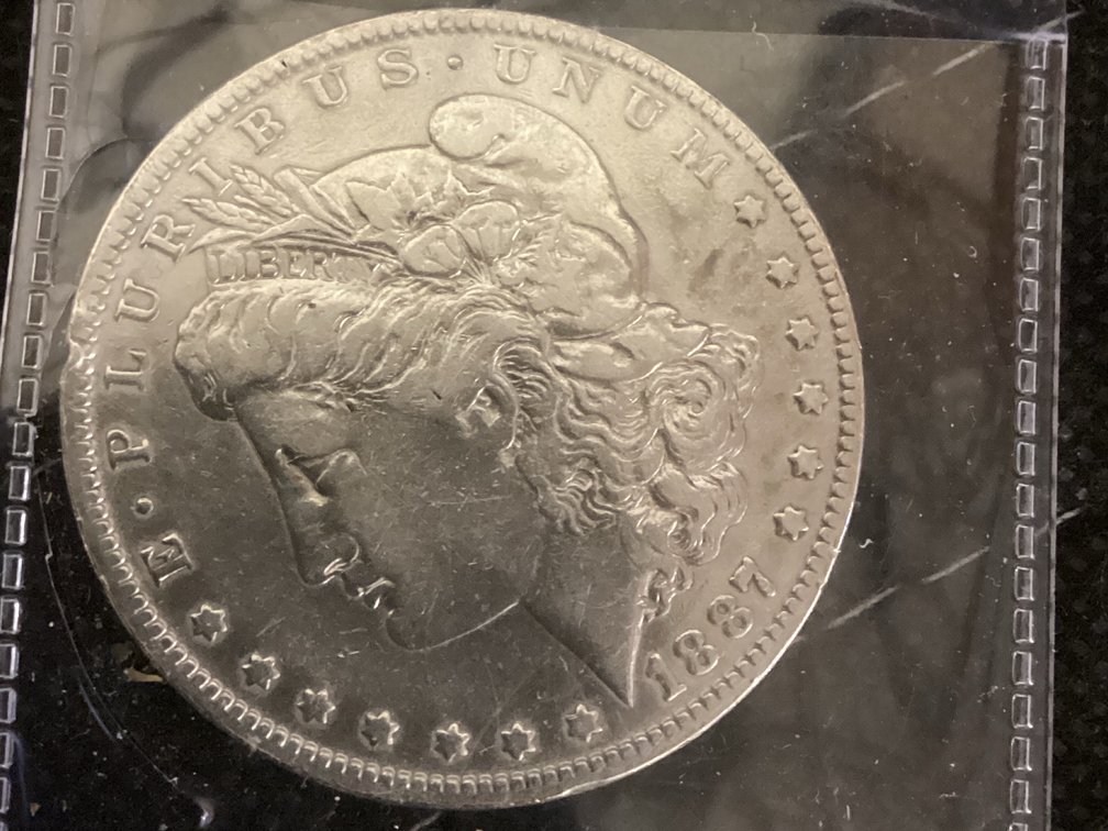 1887-O- Morgan Silver Dollar