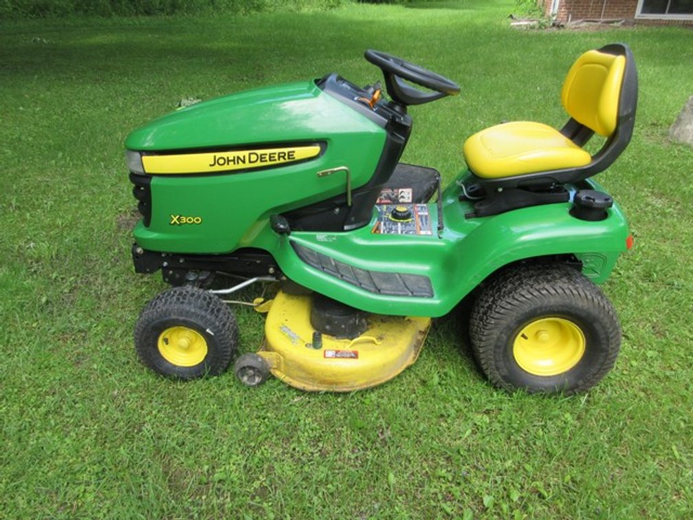 Image for John Deere Lawn Tractor, Watkins Collectibles & Household