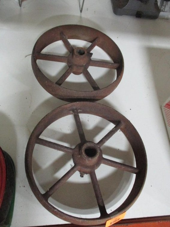 (2) cast metal wheels