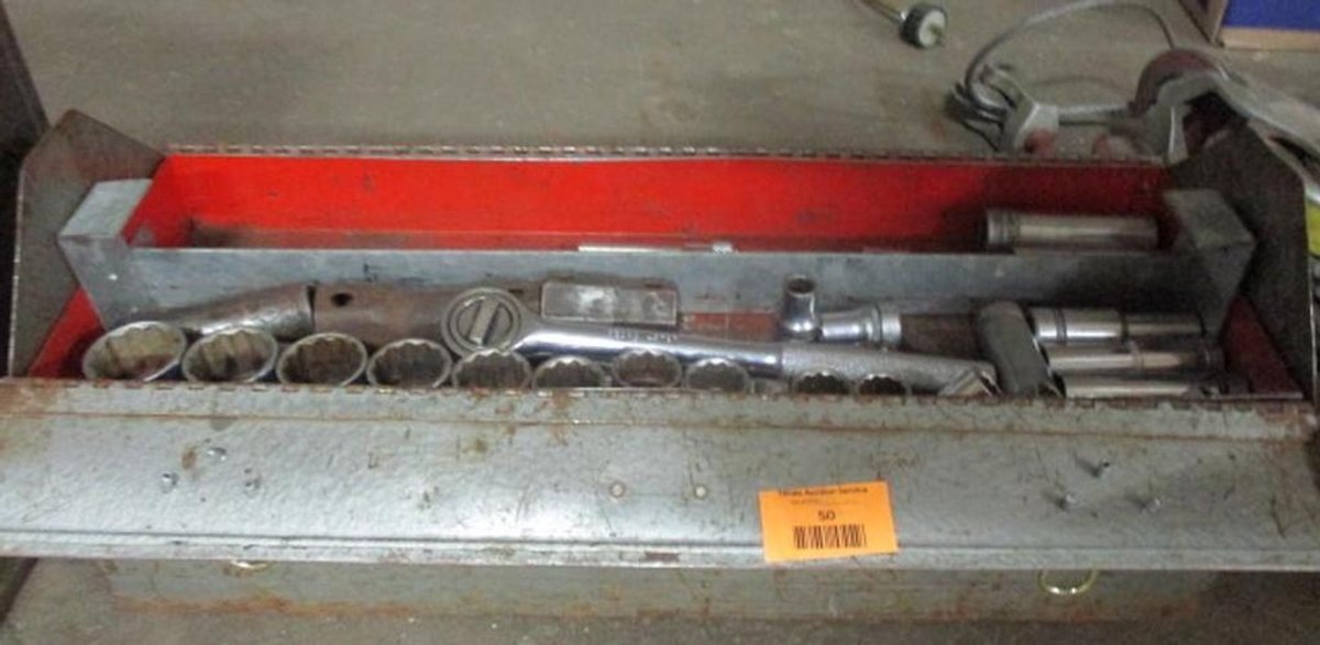 Metal tool box with 1/2" sockets and wrenches