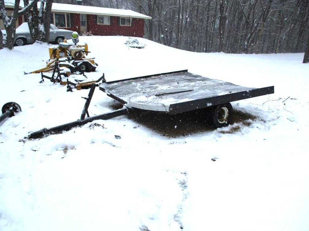 Tilt bed 2-place snowmobile trailer (no title)