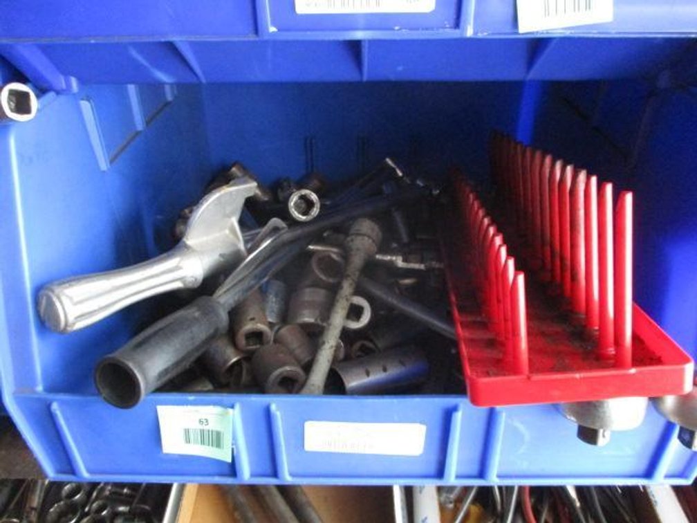 Tote of 1/2" drive sockets, ratchets and extensions